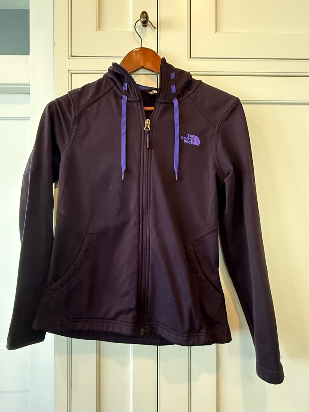 The North Face Women's Zip-Up Hooded Jacket in Black with Purple Accents